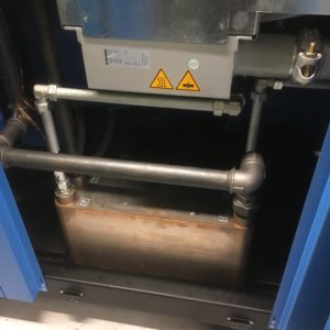 Varmegenindvinding i skruekompressor